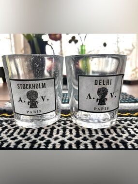 Pair of empty Astier de Villatte handblown French luxury candle vessels.